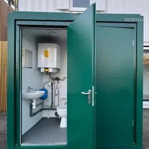 Steel-clad mains toilet and shower unit with extractor fan and lighting
