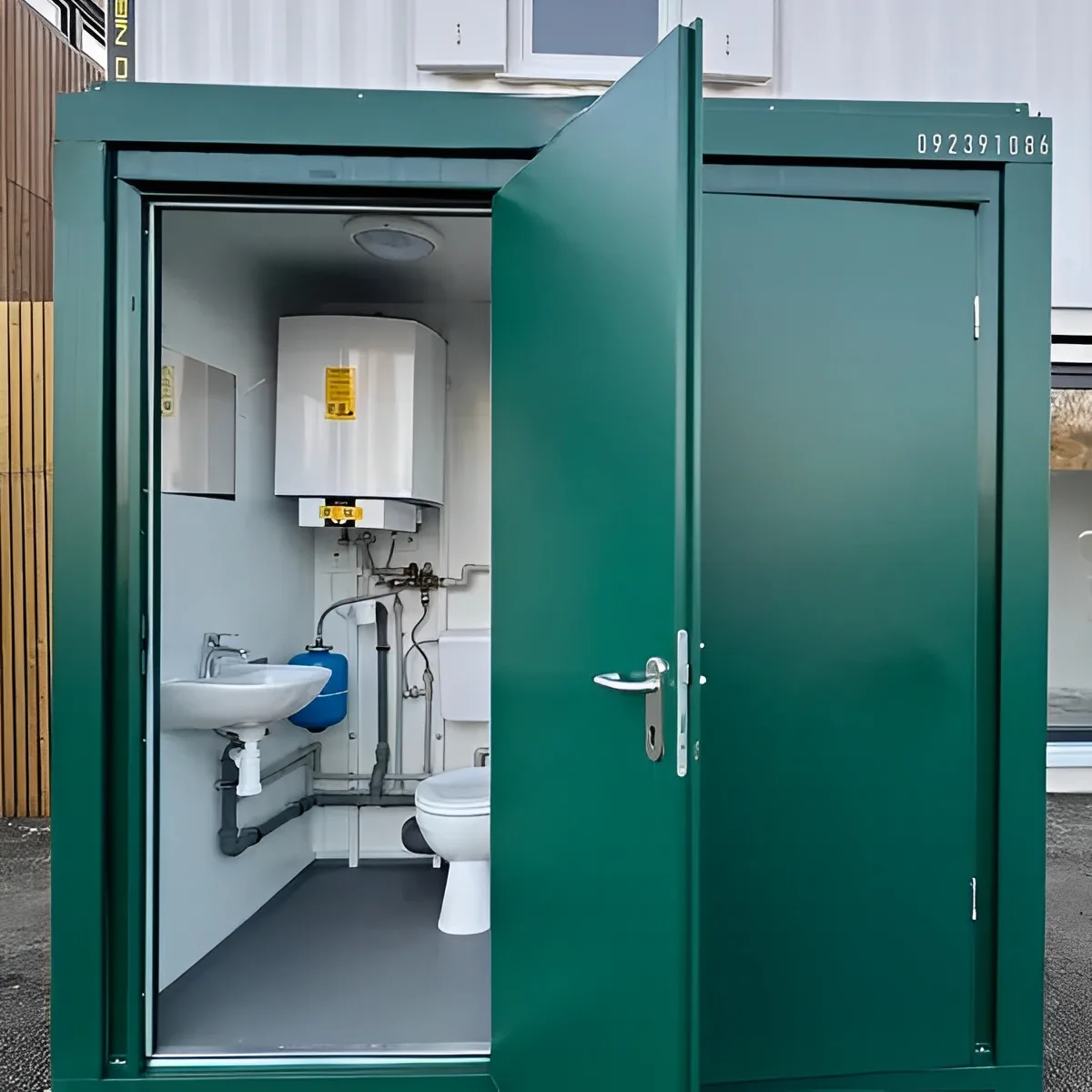 Steel-clad mains toilet and shower unit with extractor fan and lighting