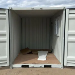 Portable workspace container with window and secure personnel door