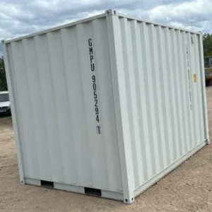 Small shipping container office with side access door and rear cargo doors