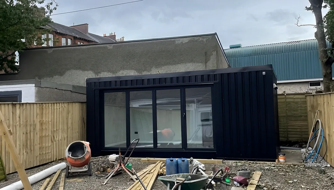 20ft container home office with full-width sliding glass patio doors