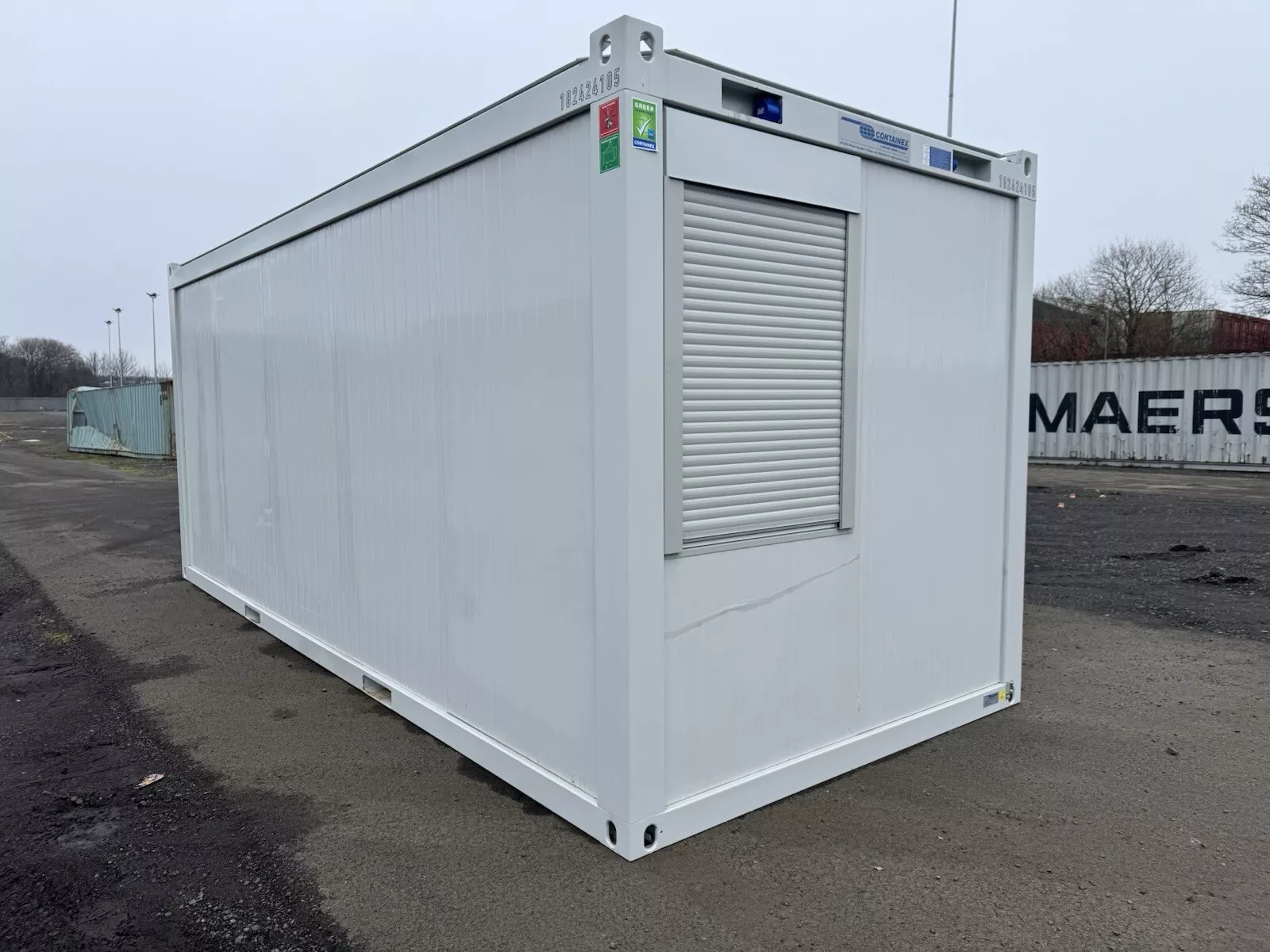Portable shipping container office for construction and industrial sites