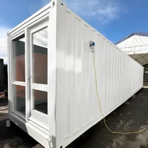 Converted 40ft shipping container office with open-plan workspace design