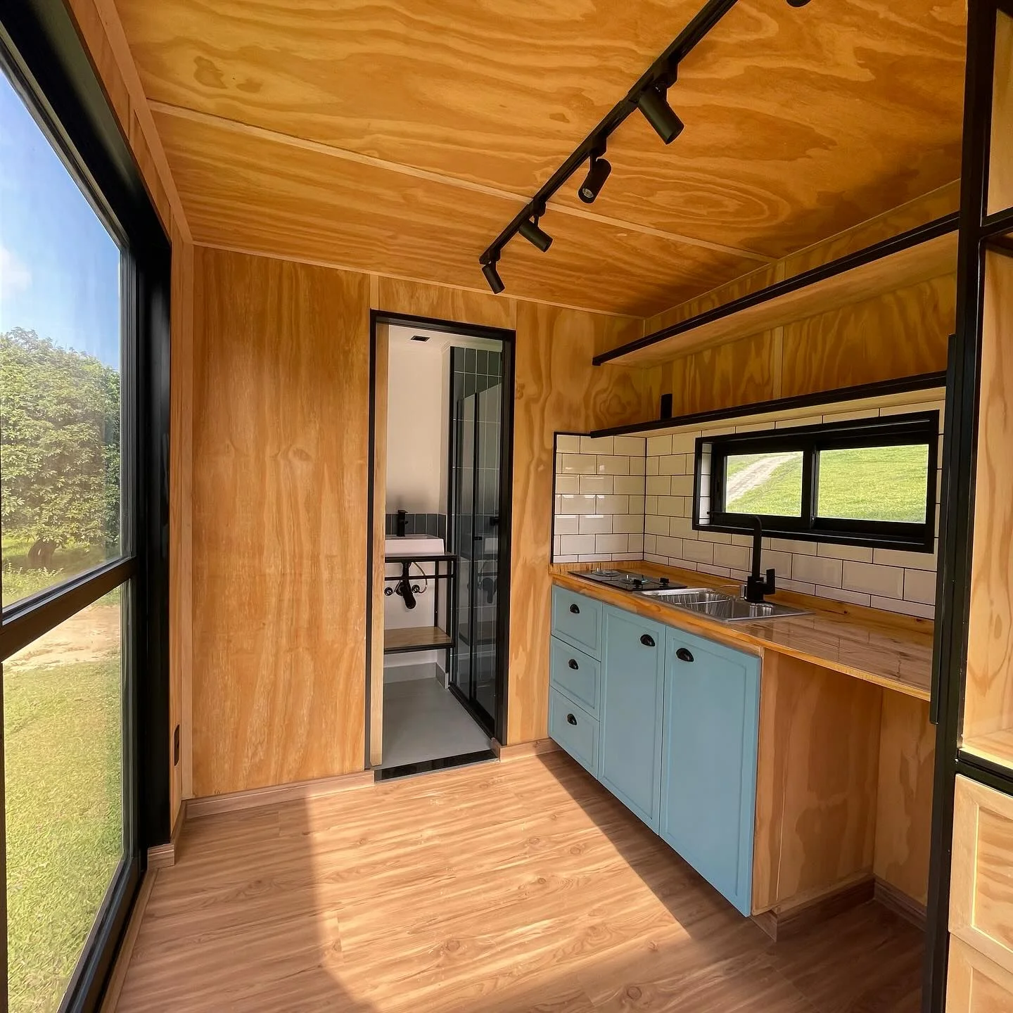 20ft container cabin home with bedroom, bathroom, and kitchenette