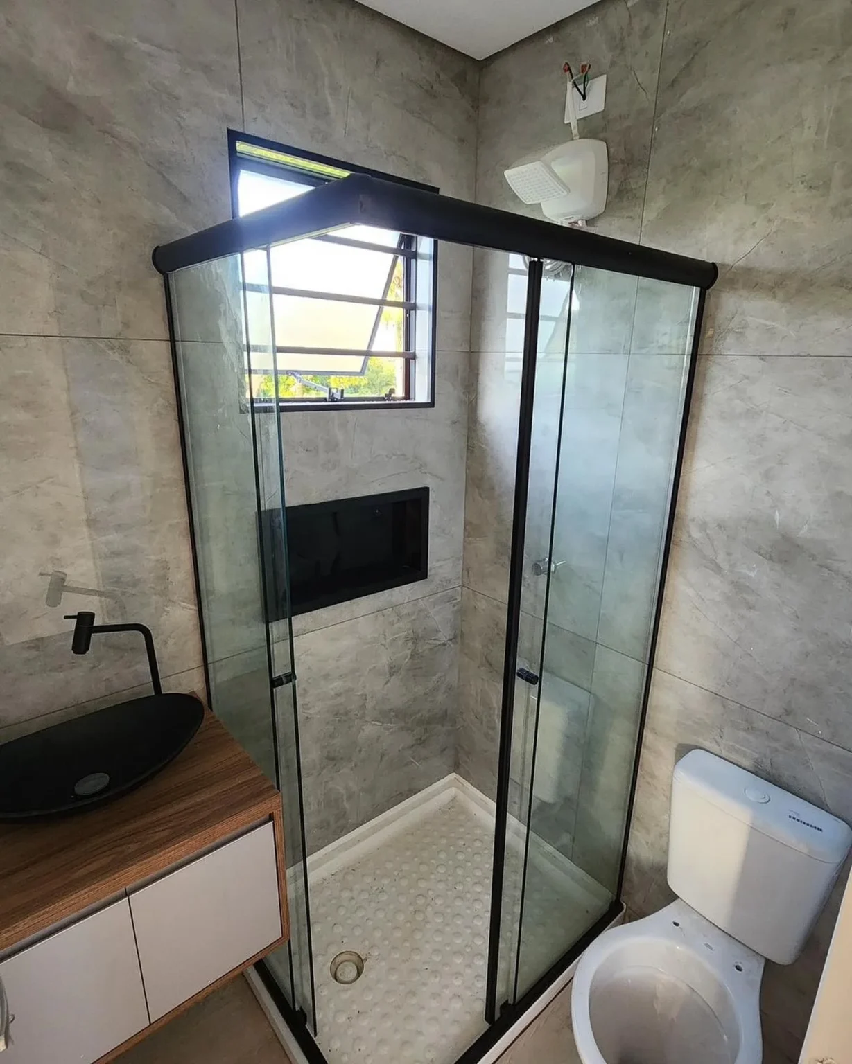20ft shipping container house with kitchen, bathroom, and water storage tank