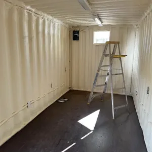 Modified shipping container with 100mm insulation and integrated electrical system