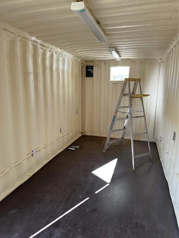 Modified shipping container with 100mm insulation and integrated electrical system