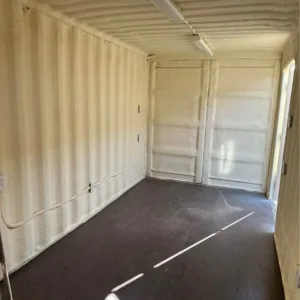40ft insulated shipping container converted into a secure workspace with lighting