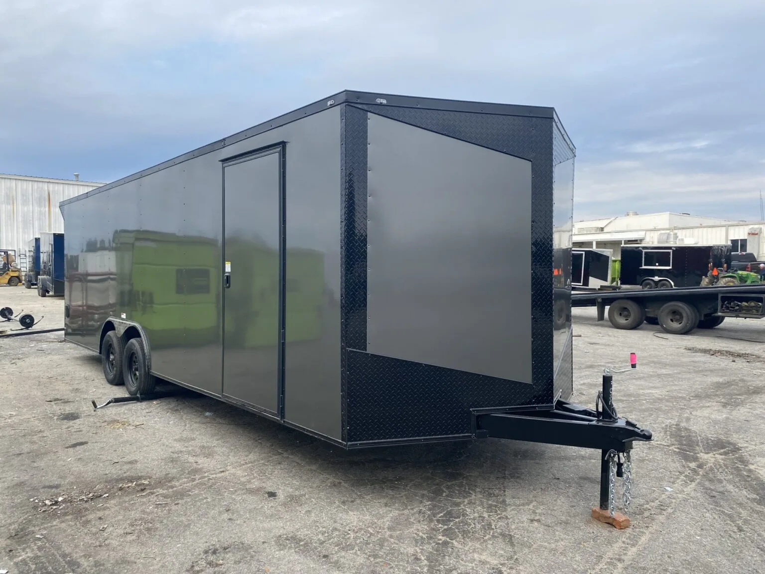 Fast Cargo 8.5x28 enclosed trailer with blackout package and charcoal gray finish