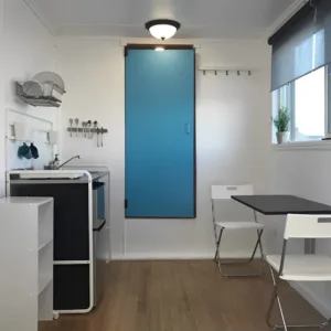 Modern tiny home built from a 20ft shipping container with large windows