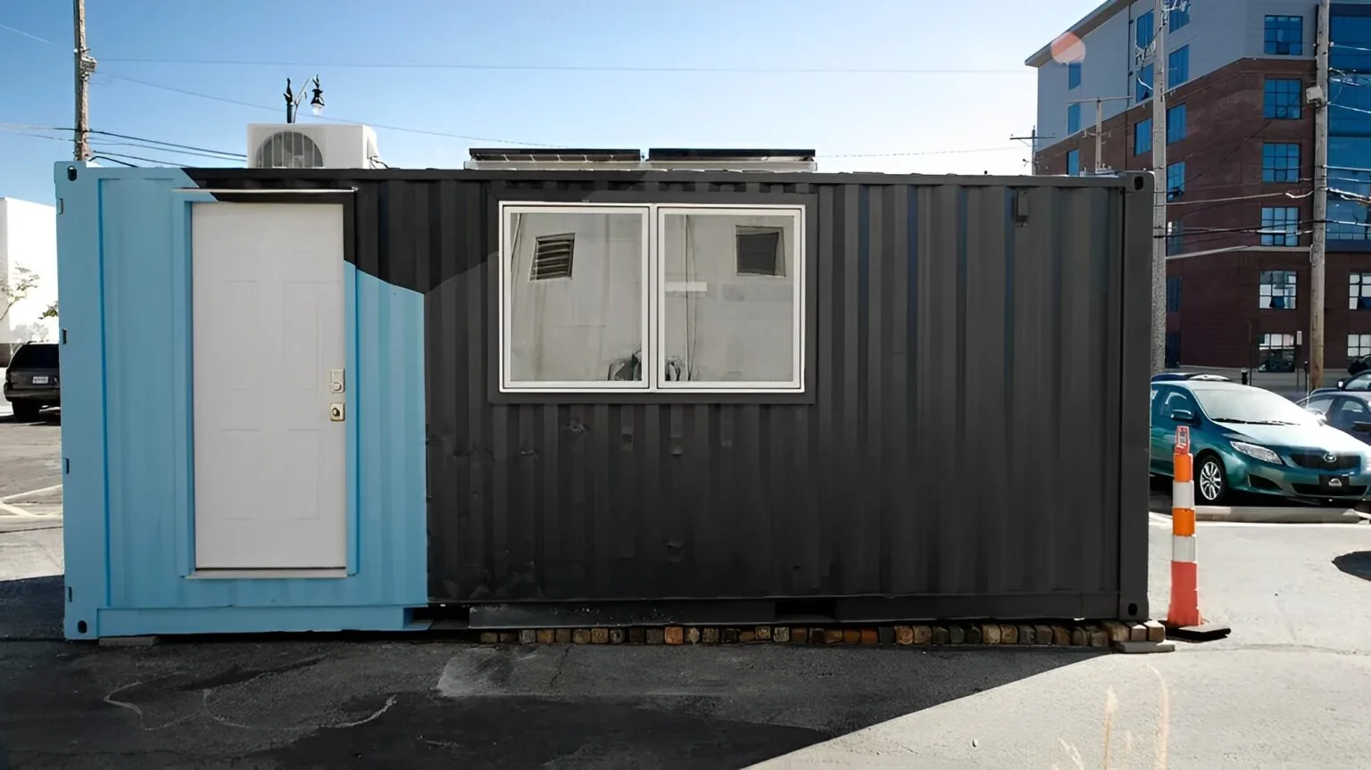20ft container home featuring kitchenette, bathroom, and Murphy bed