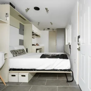 Compact container home with mini split heating and cooling system