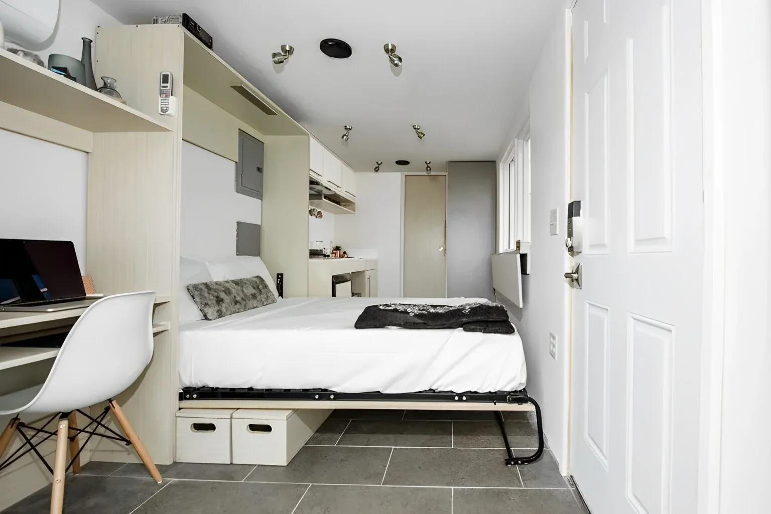Compact container home with mini split heating and cooling system