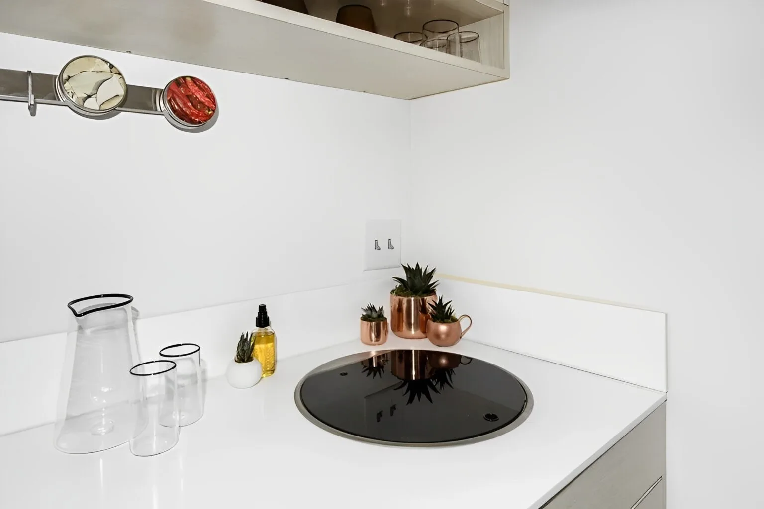 Tiny container house with custom cabinetry and breakfast bar