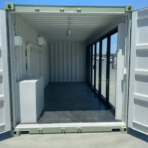 Modified 20ft container office with glass sliding door and air conditioning