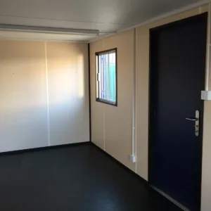 Portable office container with windows, electrical installation, and secure entry door