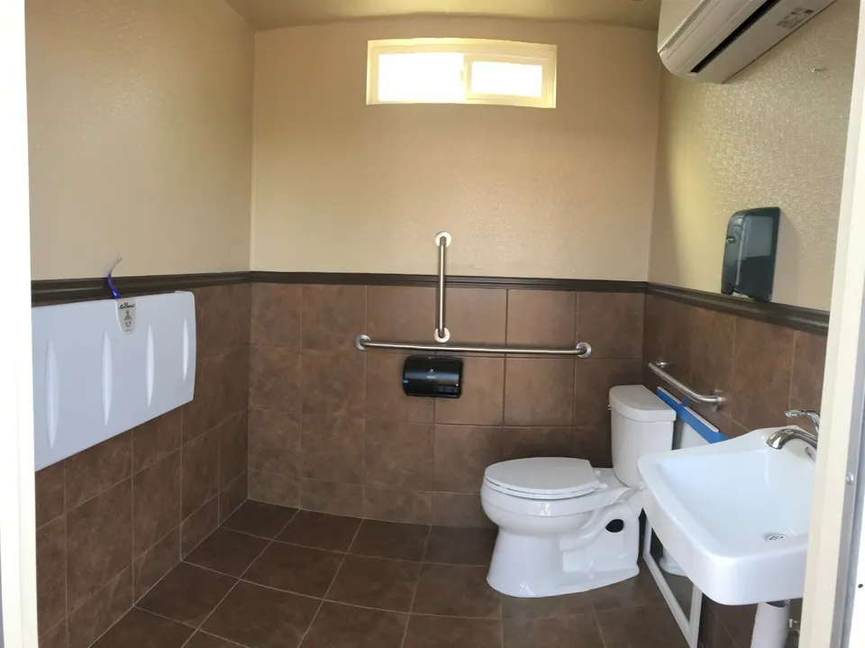 Portable Conex bathroom built from a modified shipping container