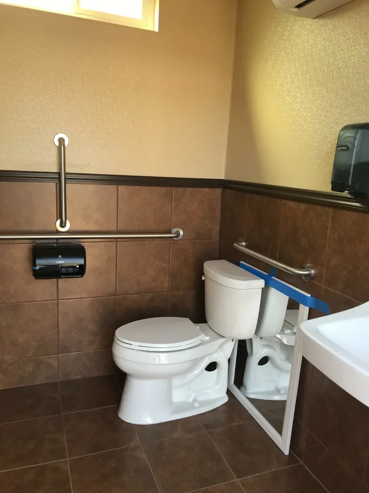 Portable bathroom container for construction sites and outdoor events