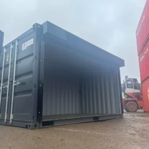 One-trip shipping container with full side access and electric roll-up door