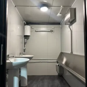 Triple toilet unit shipping container with three private restroom compartments
