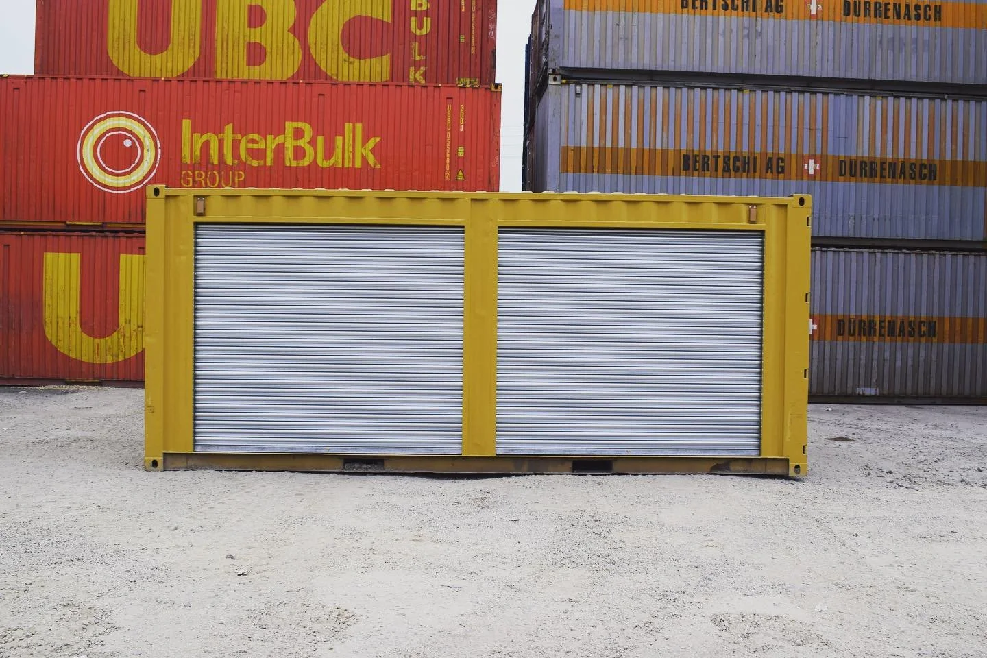 Used 20ft yellow storage container with two lockable roller shutter doors